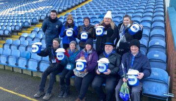 Bucket collectors at football ground